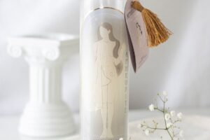 Aphrodite Goddess Tube Candle with Rose Quartz Crystals